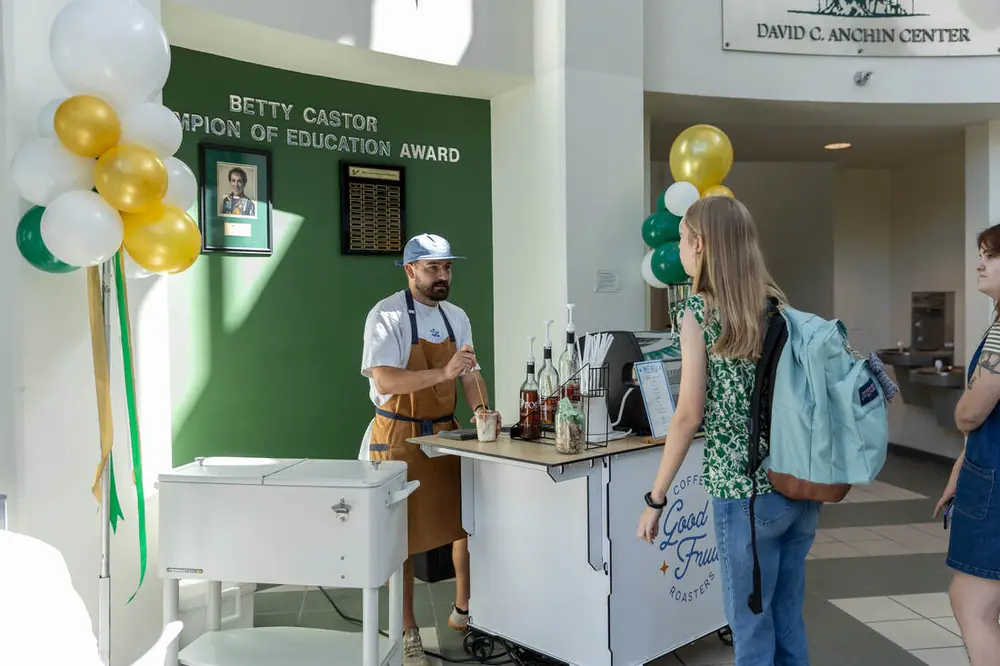 Good Fruit branded coffee cart set up inside a Tampa event space